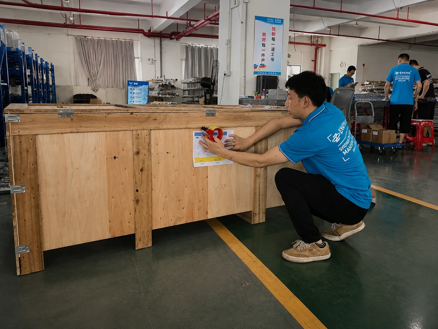Labelling a plywood export crate of shower doors